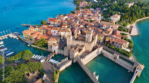 Obraz na płótnie Aerial view to the town of Sirmione, popular travel destination on Lake Garda in Italy w salonie