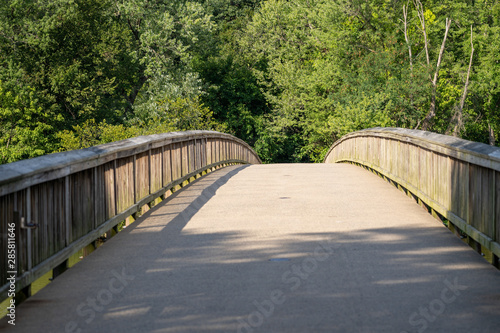 Fototapeta Naklejka Na Ścianę i Meble -  Pedestrian bridge going over the Potomac River to Theodore Roosevelt Island Park