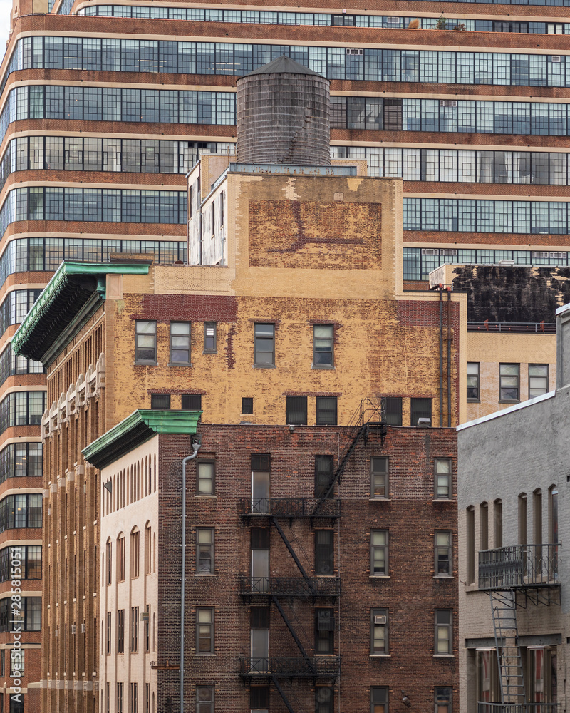 Fototapeta premium Brick tower buildings with character