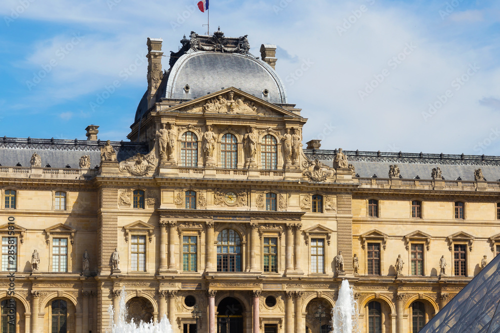 Obraz premium View of the Pavillon Sully of the Louvre in Paris, France. Is the world's largest art museum and is housed in the Louvre Palace, originally built in the late 12th to 13th century.