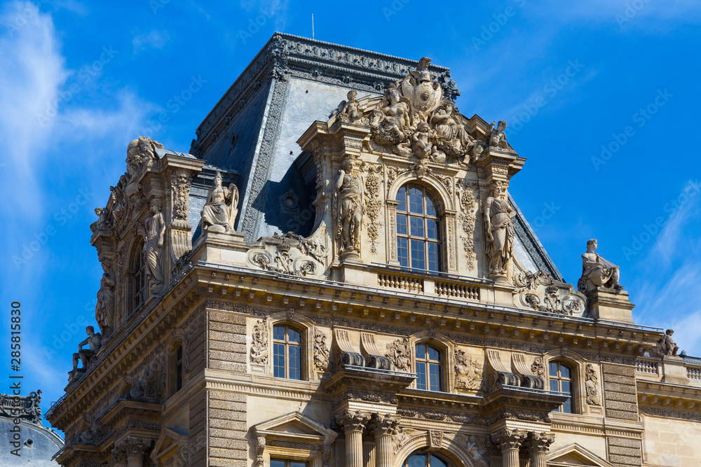 Gable of the Pavillon Mollien of the Louvre in Paris, France. Is the world's largest art museum and is housed in the Louvre Palace, originally built in the late 12th to 13th century.