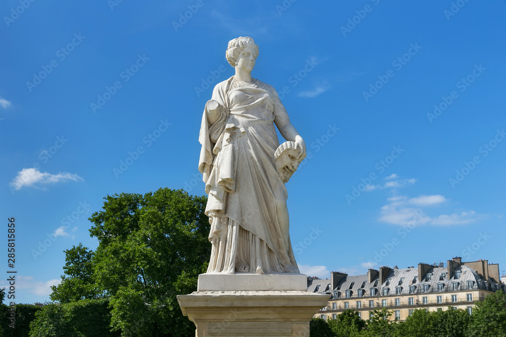 View of the marble sculpture La Comedie (1875) by Julien Toussaint Roux in the Tuileries Park, Paris, France.