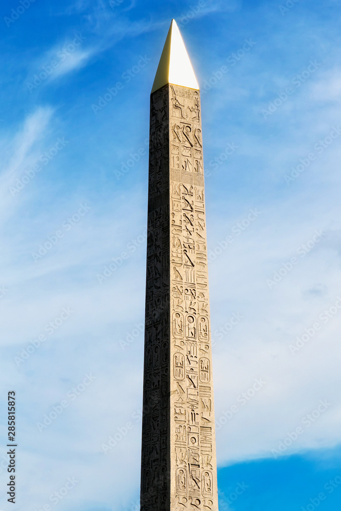 View of the Luxor Ancient Egyptian Obelisk at the centre of the Place de la Concorde in Paris, France. It was originally located at the entrance to Luxor Temple, in Egypt.