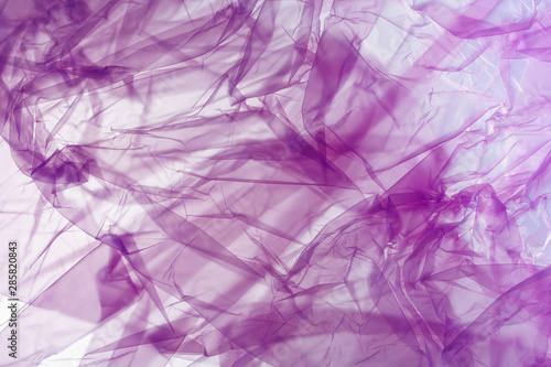 abstract purple background, crumpled lilac plastic bag