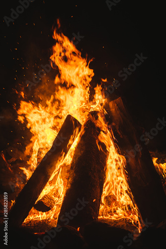 A burning summer bonfire. Outdoor camping. 