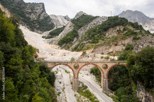 Ponti di Vara bridges in Carrara marble quarries, Tuscany, Italy. In the Apuan Alps. Quarrying marble stone is an important industry in the area. photo