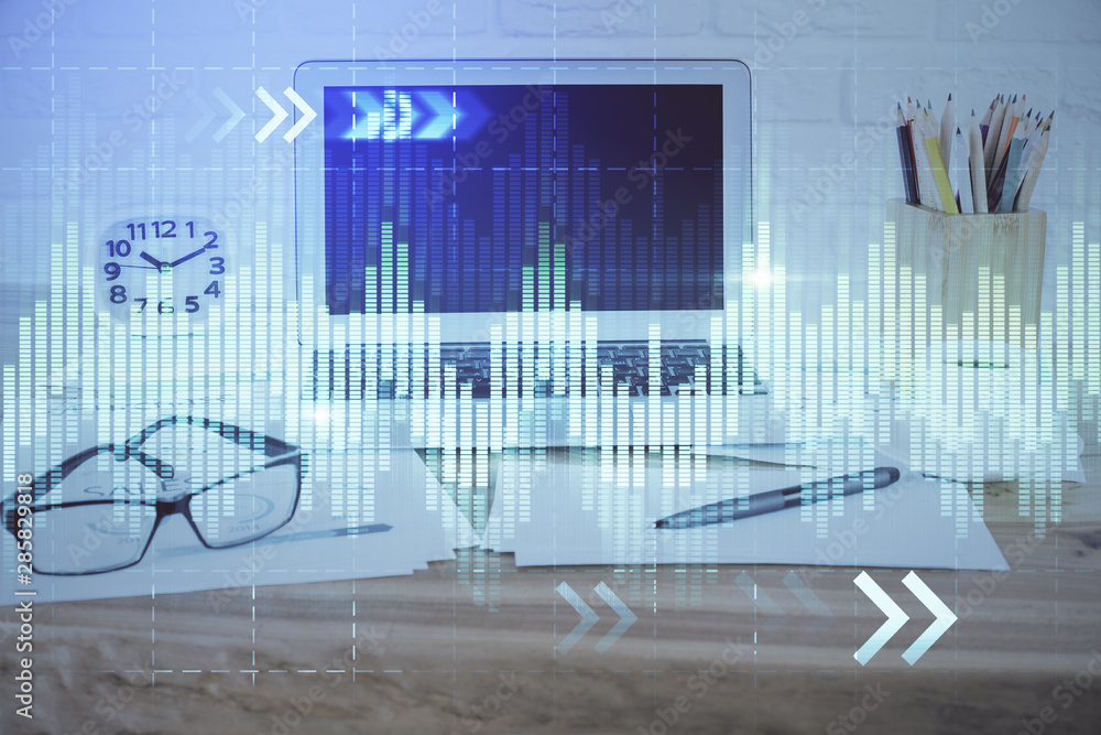Forex market chart hologram and personal computer background. Double exposure. Concept of investment. Forex market chart hologram and personal computer background. Double exposure. Concept of investment.