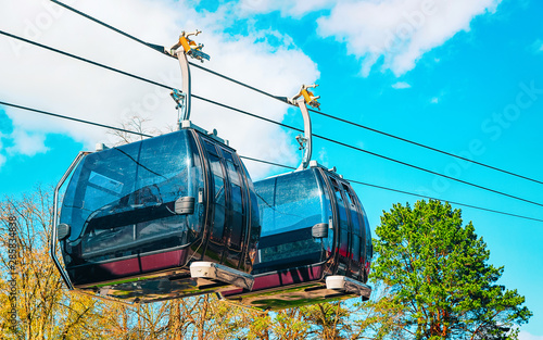 EU Cable cars moving at ropeway photo