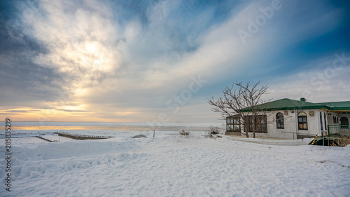 House With Winter Snow Landscape © Aris Suwanmalee