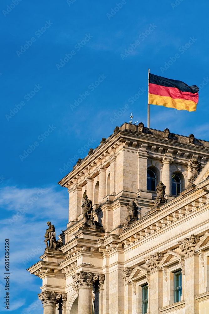 Reichstag building architecture with German Flag of Berlin city center