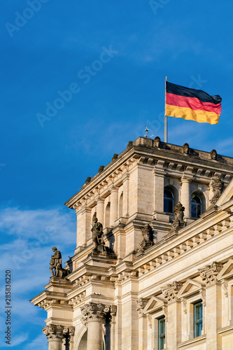 Reichstag building architecture with German Flag of Berlin city center