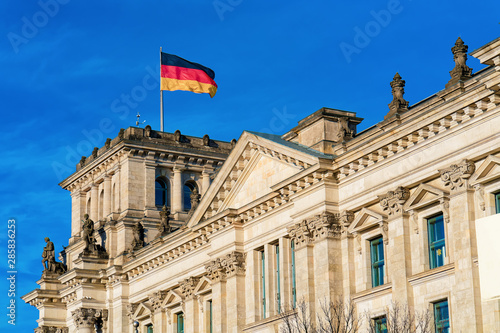 Reichstag building architecture with German Flag in Berlin city center