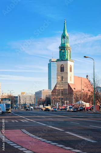 Cityscape view with road in Berlin and St Mary Church
