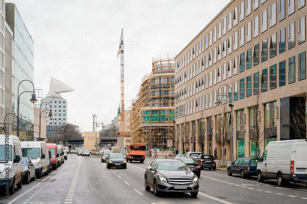 Street with cars and building construction in road in Berlin