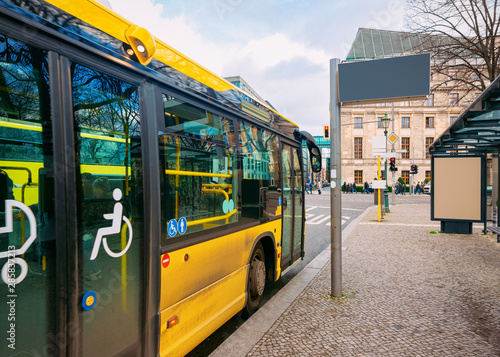 Yellow bus with entrance door for people with disability Berlin