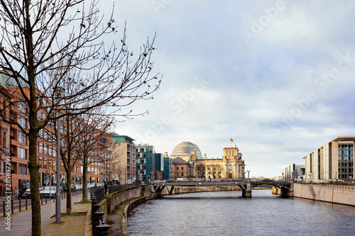 Street Bridge at Reichstag building and German Flag Berlin photo