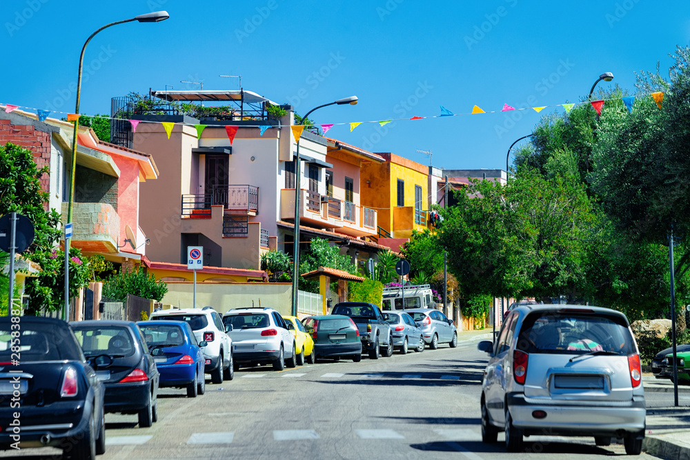 Street view with cars parked in Road Cagliari