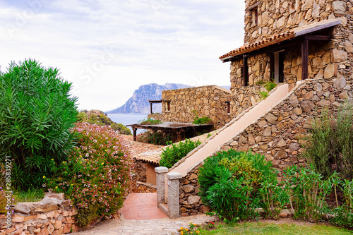 Cottage at Capo Coda Cavallo at Mediterranean sea photo