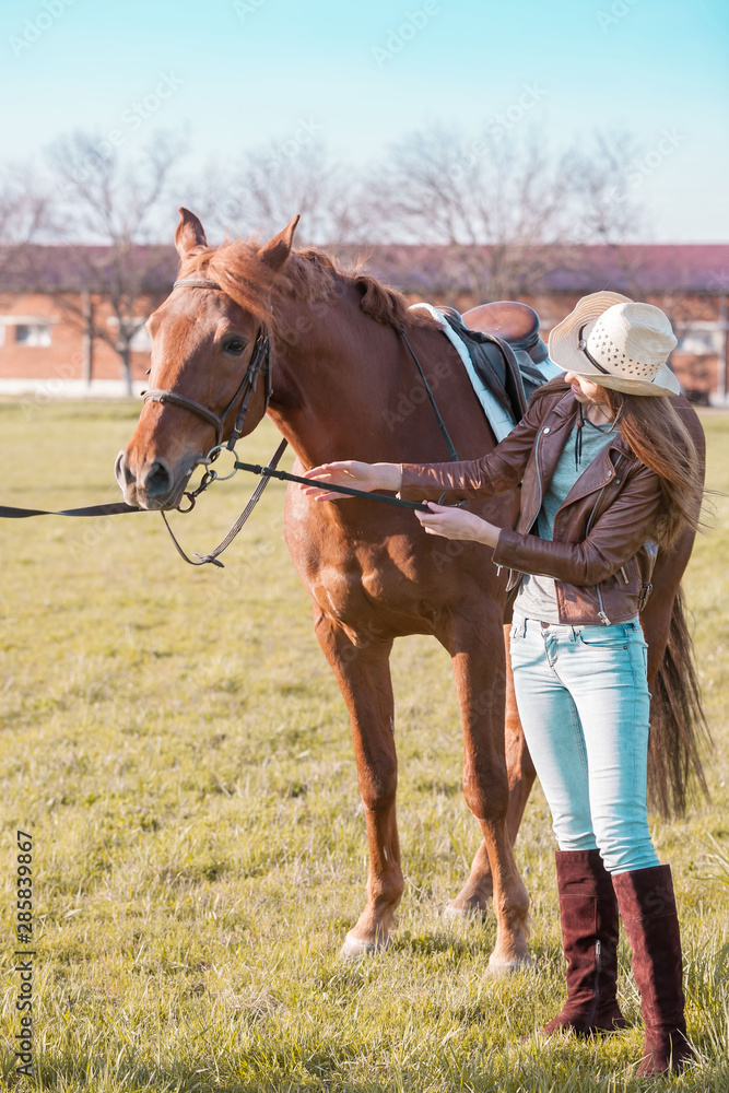 Woman and horse. Sunset. Full height Woman and horse. Sunset. Full height