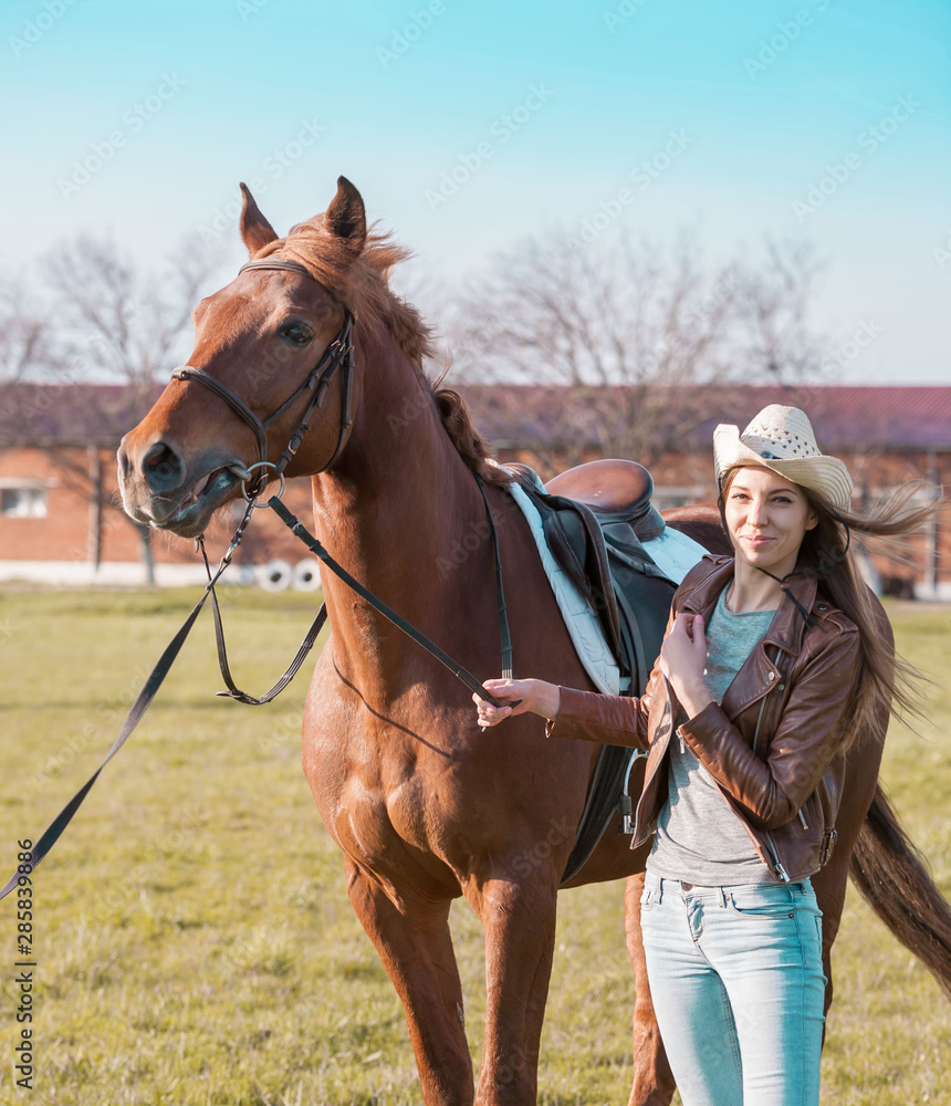 Obraz premium Woman and horse. Sunset. Full height