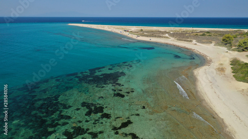 Aerial drone photo of iconic exotic sandy peninsula and sandy beach of Possidi with turquoise clear sea, Kassandra, Halkidiki, North Greece © aerial-drone