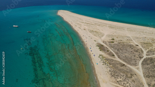 Aerial drone photo of iconic exotic sandy peninsula and sandy beach of Possidi with turquoise clear sea, Kassandra, Halkidiki, North Greece