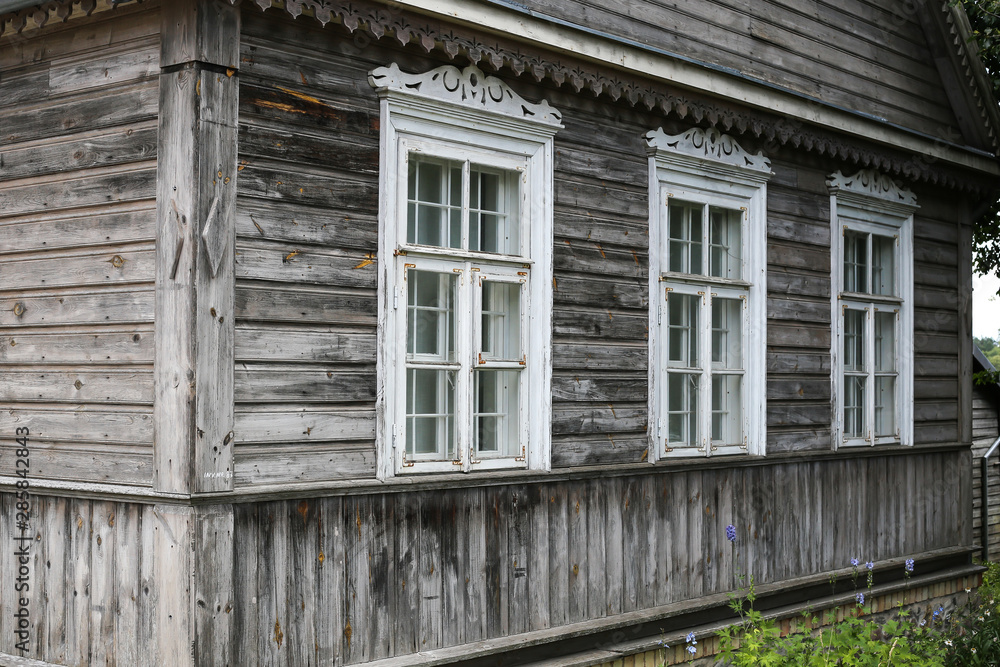 Antique old house with grey old wood. Typical house in Lithuania, Trakai