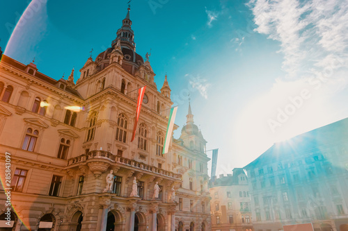 Sunlight at Town Hall with flags in Graz photo