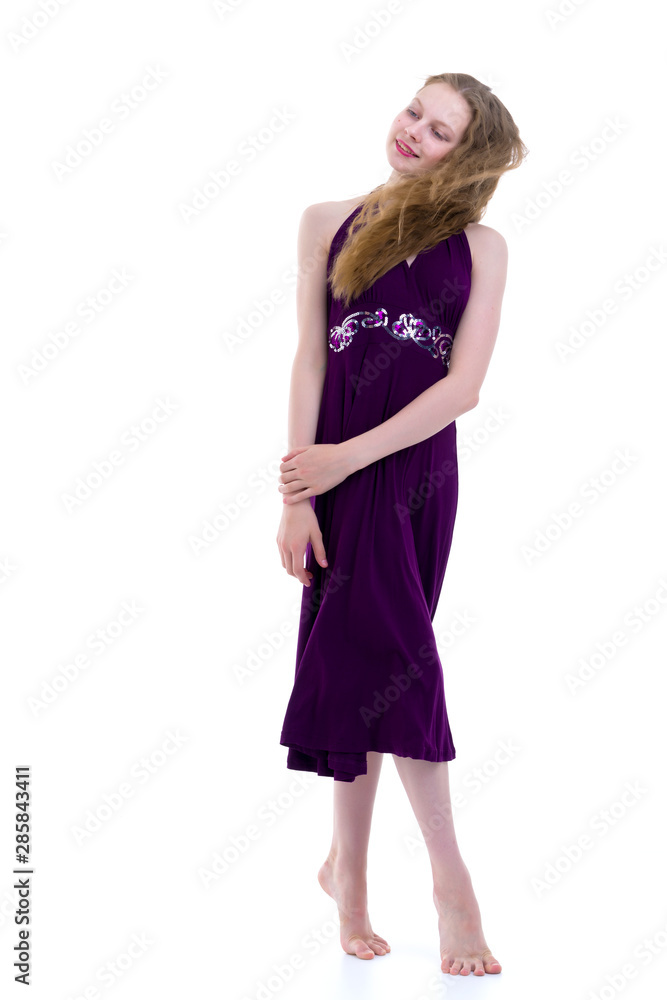 Little girl in a dress developing in the wind. Little girl in a dress developing in the wind.
