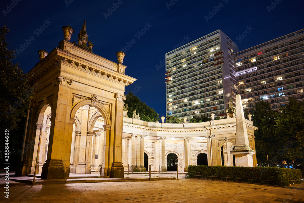Colonnade in the late Baroque style Spittelkolonnaden at night in the city of Berlin.