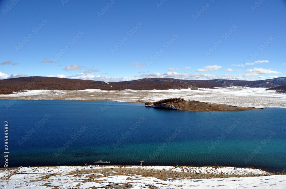 blue lake with snow (Lake Khovsgol, Mongolia - Siberia)