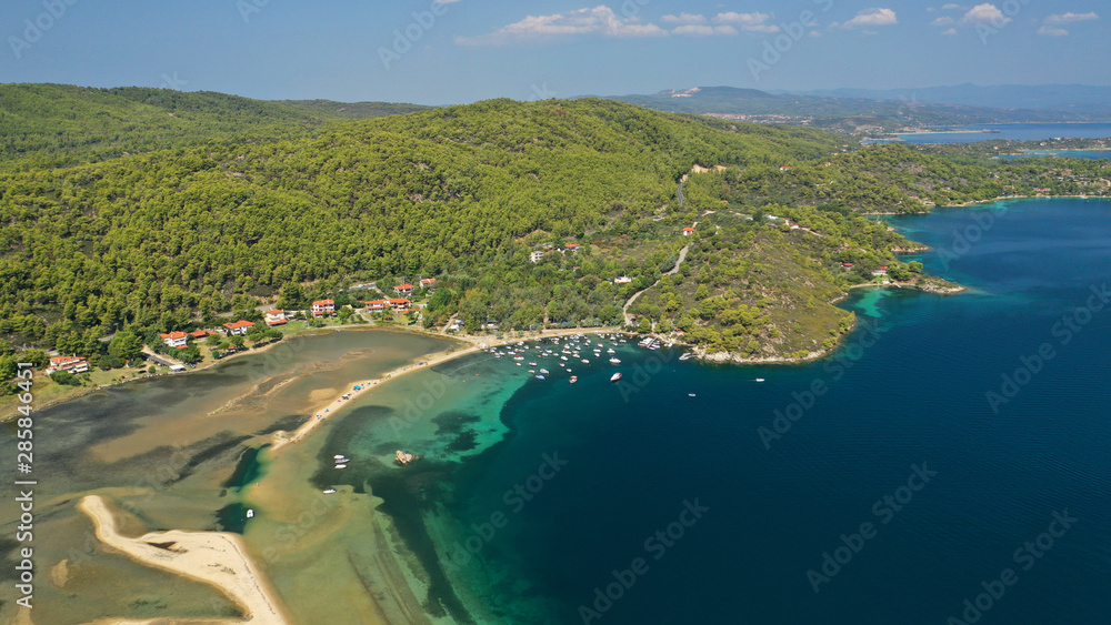 Aerial drone view of iconic Livari beach in natural exotic bay of Vourvourou, Sithonia peninsula, Halkidiki, Greece Aerial drone view of iconic Livari beach in natural exotic bay of Vourvourou, Sithonia peninsula, Halkidiki, Greece