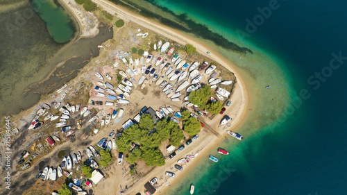 Aerial drone view of iconic Livari beach in natural exotic bay of Vourvourou, Sithonia peninsula, Halkidiki, Greece photo