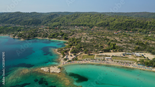 Fototapeta Naklejka Na Ścianę i Meble -  Aerial drone photo of turquoise bay near famous Vourvourou and Diaporos island, Sithonia peninsula, Halkidiki, North Greece