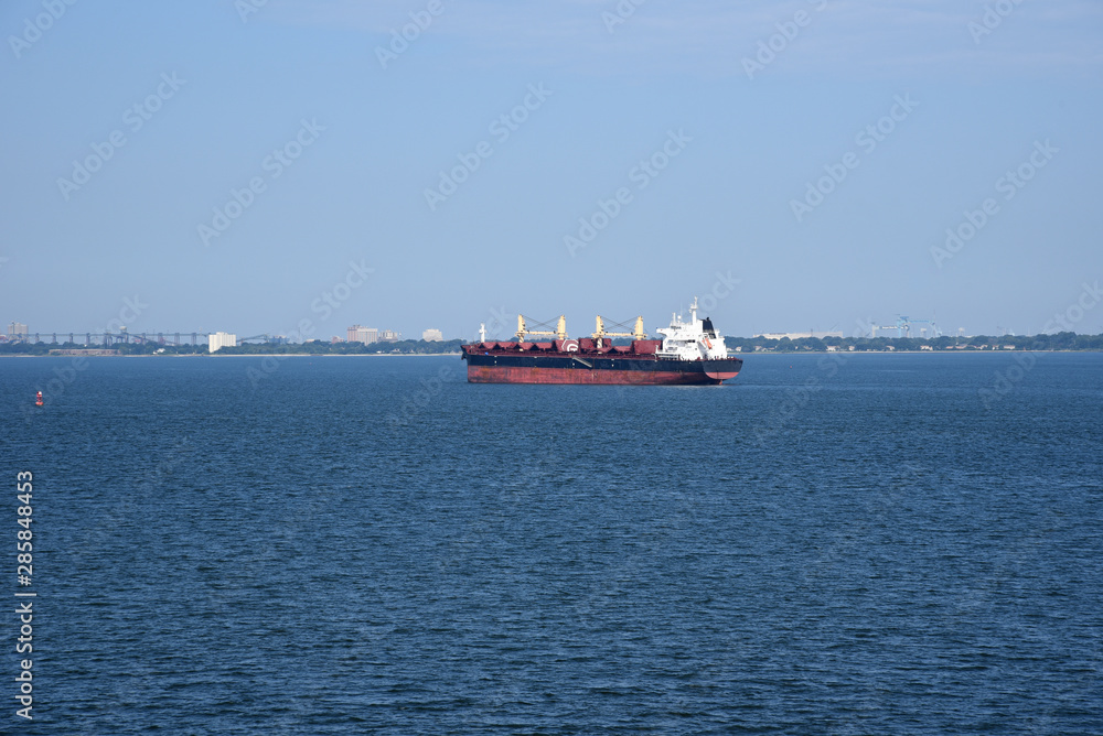 Cargo ship waiting on the road to enter port of Norfolk, Virginia. 