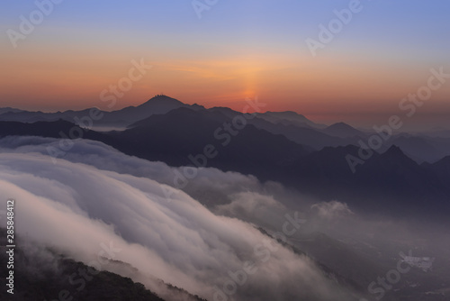 sunset in the mountains, cloud fall