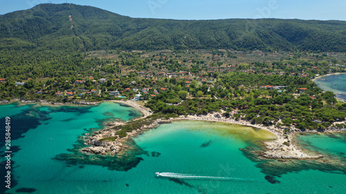 Aerial drone photo of iconic turquoise paradise sandy twin beaches of Karidi in Sithonia Peninsula, Vourvourou bay, Halkidiki, North Greece photo