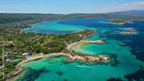 Aerial drone photo of iconic turquoise paradise sandy twin beaches of Karidi in Sithonia Peninsula, Vourvourou bay, Halkidiki, North Greece photo
