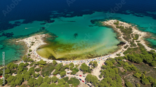 Fototapeta Naklejka Na Ścianę i Meble -  Aerial drone photo of iconic turquoise paradise sandy twin beaches of Karidi in Sithonia Peninsula, Vourvourou bay, Halkidiki, North Greece