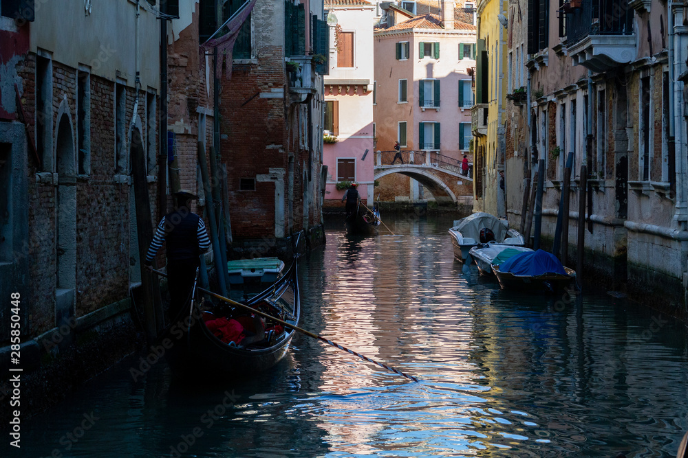 Venezia (Venice), Italy. 2 February 2018. Gondolas and boats on the rivers of Venice.