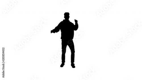 Silhouette Hip-Hop style man in red hoody dancing. photo