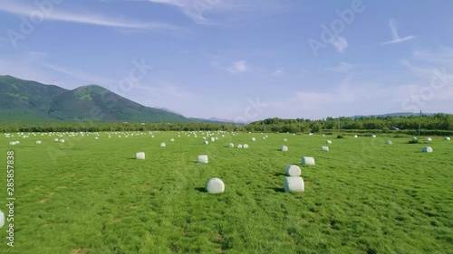 Drone  conducts  video shooting on agricultural fields where I harvest hay.