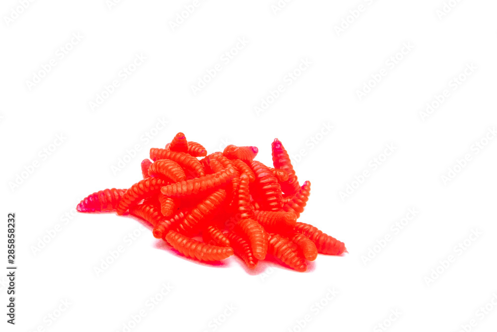 Red Artificial fishing larvae of insects on white background with soft shadow Red Artificial fishing larvae of insects on white background with soft shadow