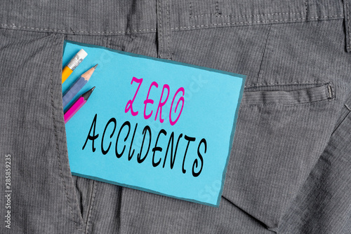 Conceptual hand writing showing Zero Accidents. Concept meaning important strategy for preventing workplace accidents Writing equipment and blue note paper in pocket of trousers