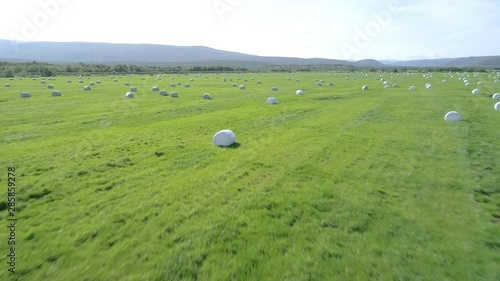 Drone  conducts  video shooting on agricultural fields where I harvest hay.
