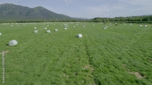 Drone  conducts  video shooting on agricultural fields where I harvest hay.
