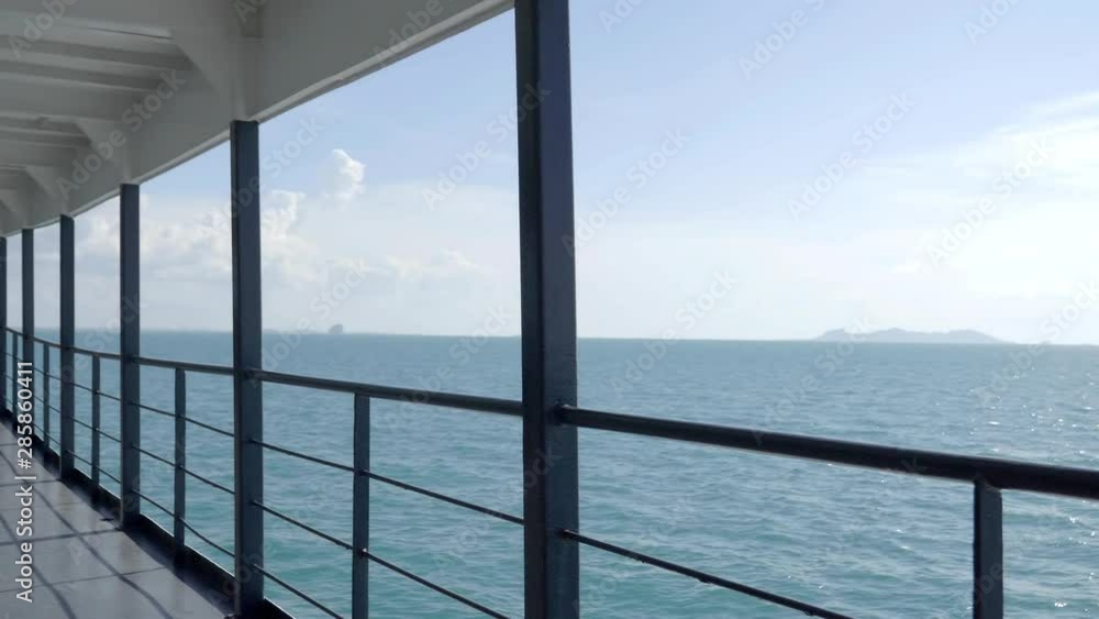 Angled shot the sea and part of a ship with islands in the background. Angled shot the sea and part of a ship with islands in the background.