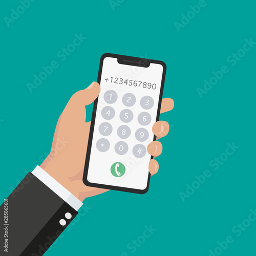 Dial number concept. Businessman holding the phone with buttons and numbers on the mobile phone screen to make a phone call