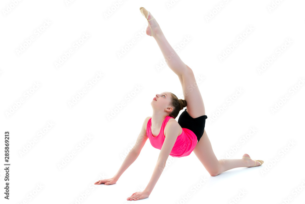 The gymnast perform an acrobatic element on the floor. The gymnast perform an acrobatic element on the floor.