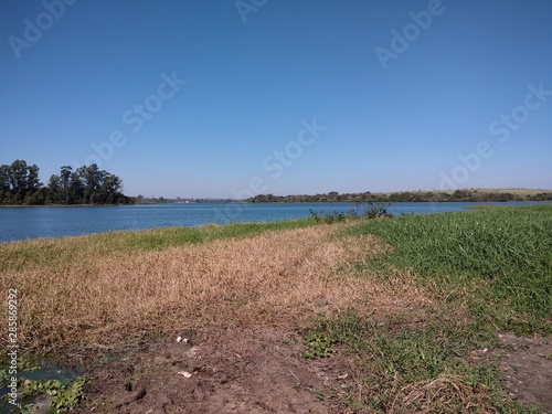 landscape with lake and blue sky